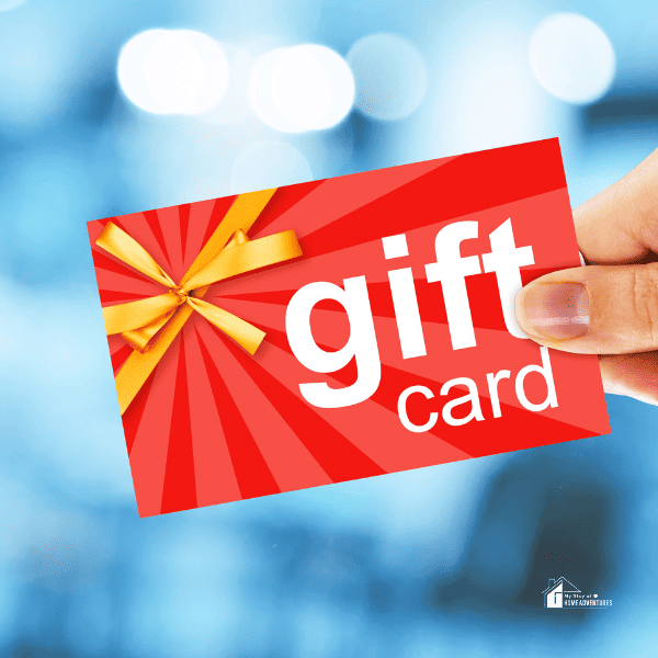 Person's Hand Holding Gift Card