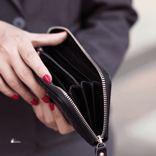 Female Hands Holding Empty Wallet