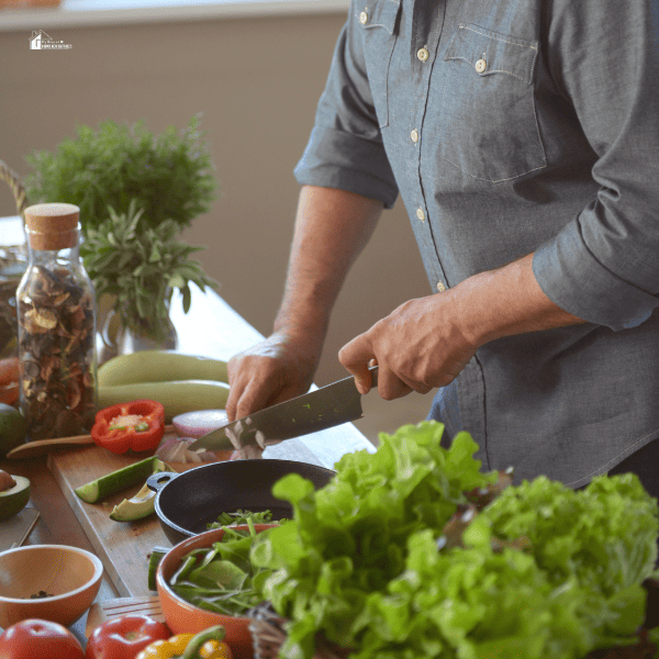 a man chopping something to cook