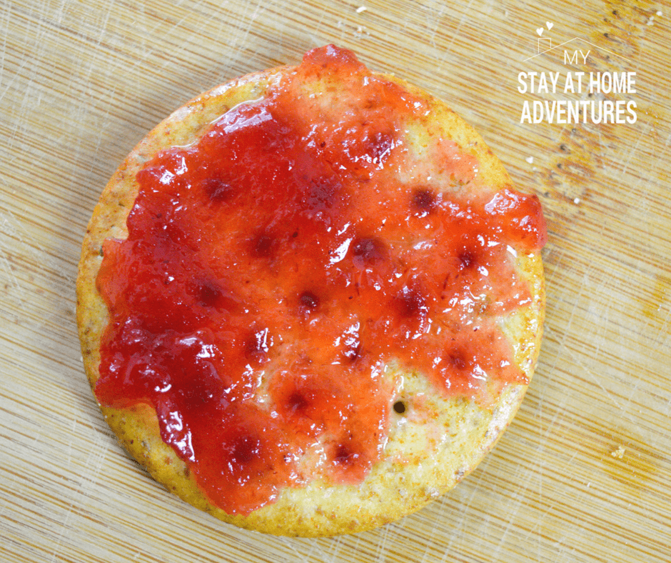 cranberry jelly over cracker