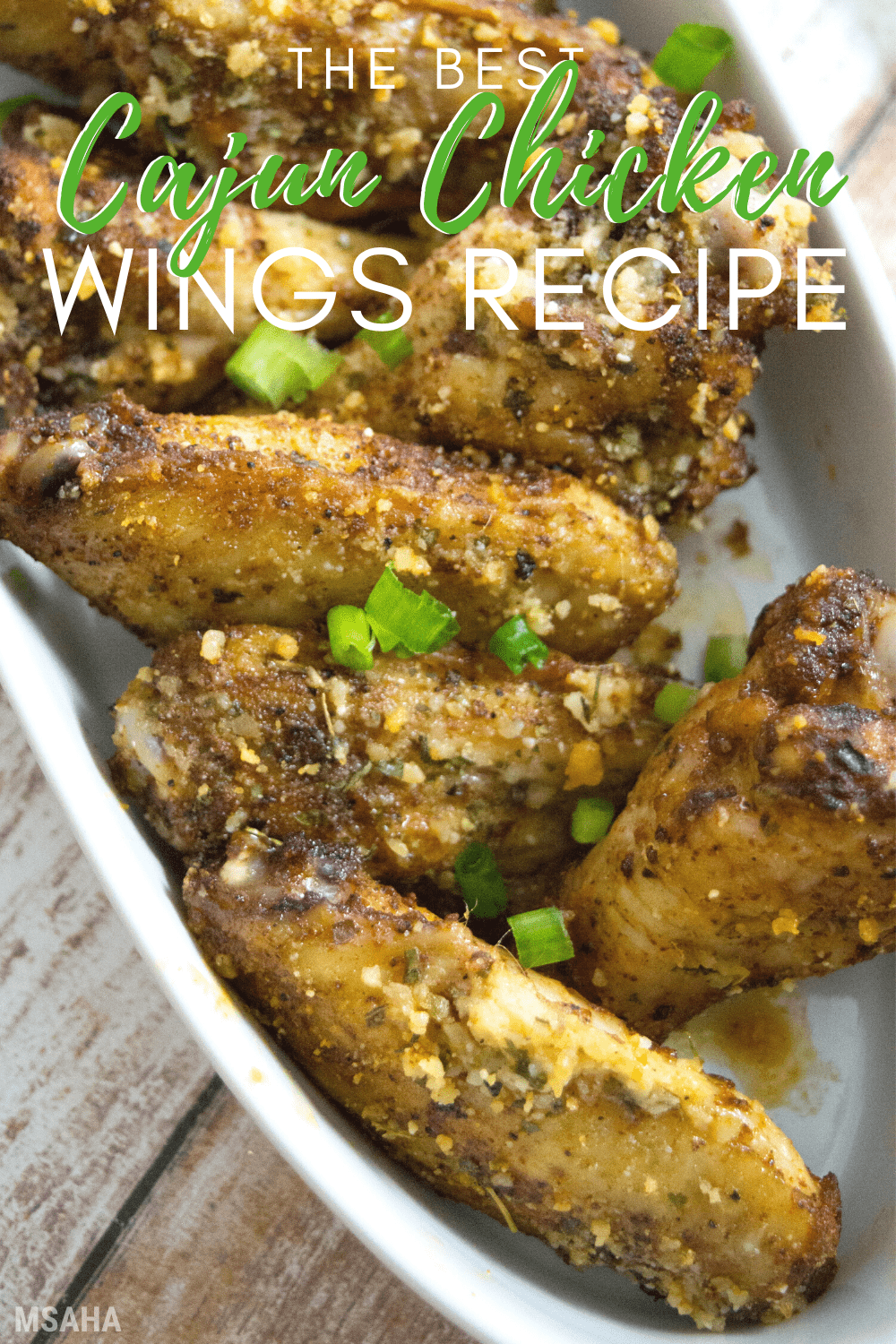 Learn how to make this crispy and delicious and spicy Cajun Chicken Wings. Baked to perfections and coated with a delicious sauce. #chickenrecipe #chickenwings #bakedchickenwings via @mystayathome