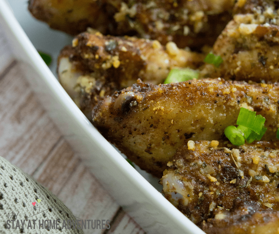 Baked Cajun chicken wings close up.