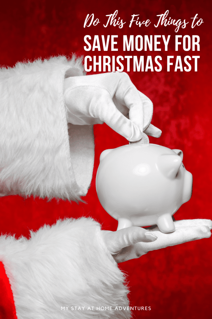 Santa saving money for Christams, red background.