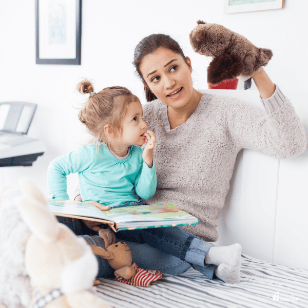 mom telling story to her daughter