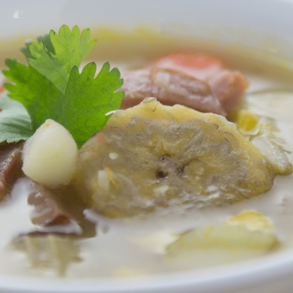 Close of photo of plantain and ham soup.