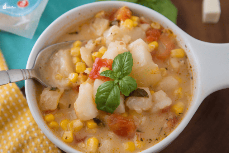 An image of Sopas de Papas y Tomate/Tomato and Potato Soup With Tropical Queso Blanco. The site's link is also included in the image.