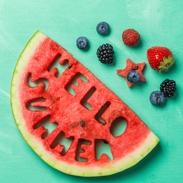 Hellow Summer concept- letters carved from watermelon.