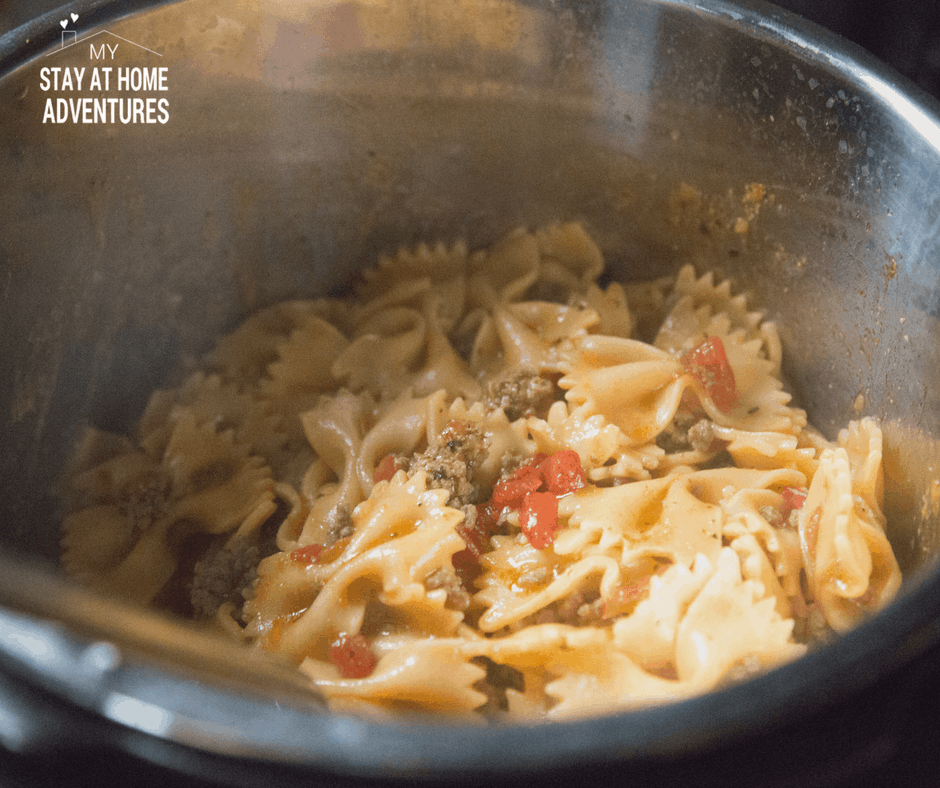 cooked beef and pasta inside instant pot