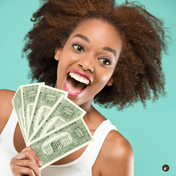 woman holding cash