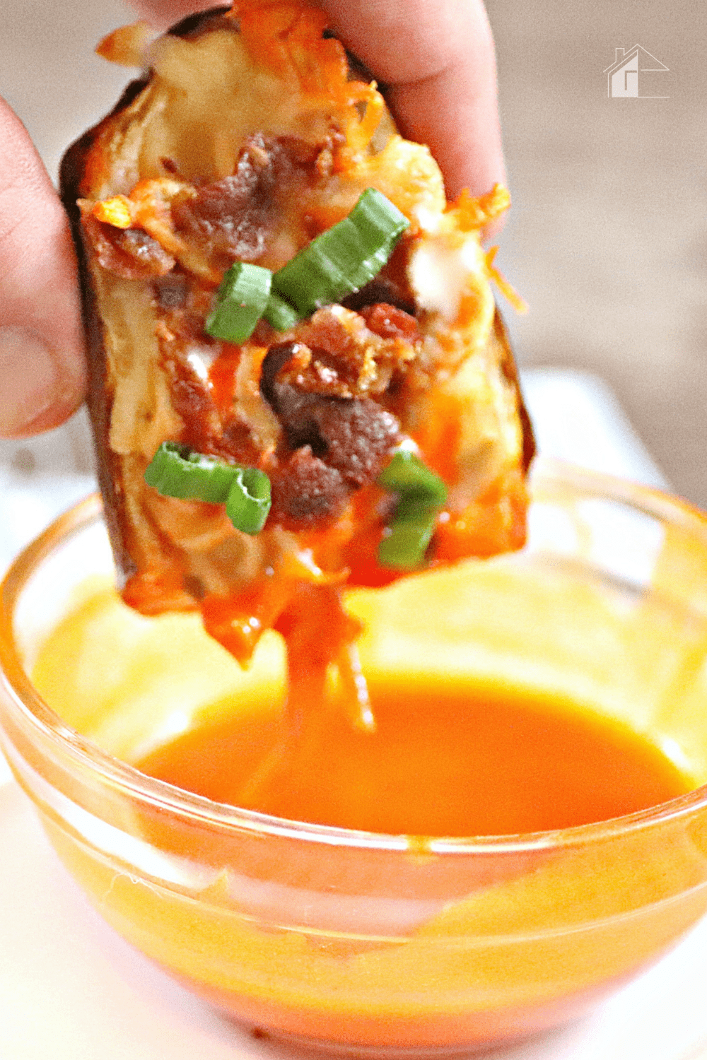 Are you looking for an easy and delicious snack? Then you must try this recipe for Air Fryer Buffalo Chicken Potato Skins. via @mystayathome