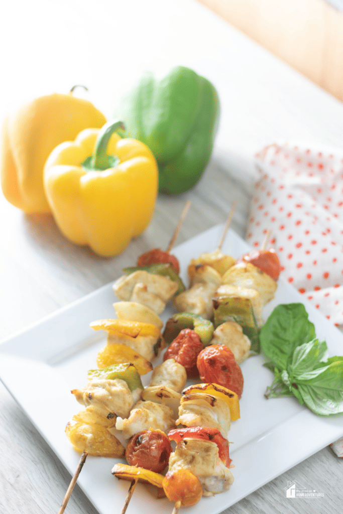 Air Fryer Curry Chicken Kabobs on a white plate