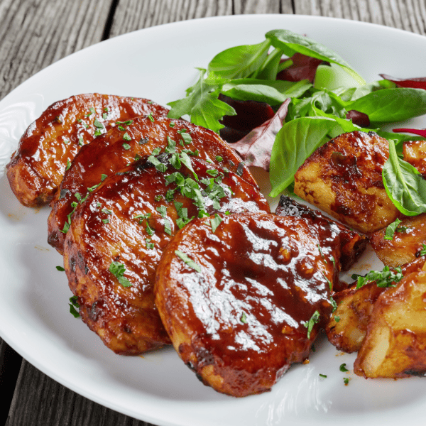 Oven baked with glazed served with potatoes and greens