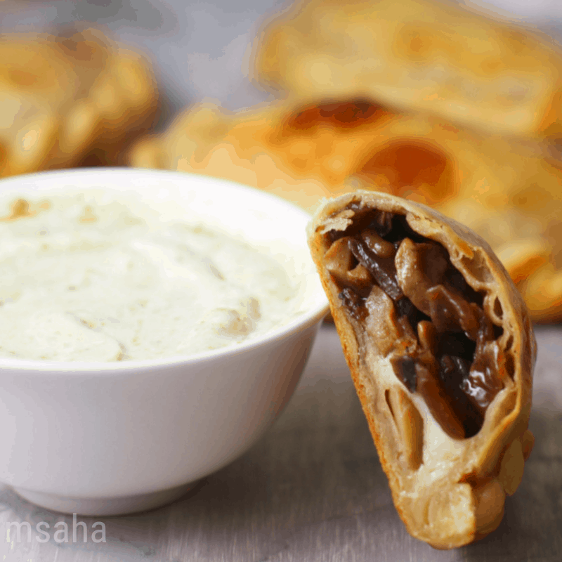 Argentinian Empanadas stuffed with cheese and mushrooms.