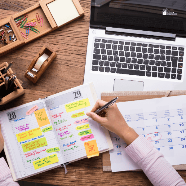 close up image of someone writing schedule in a desk