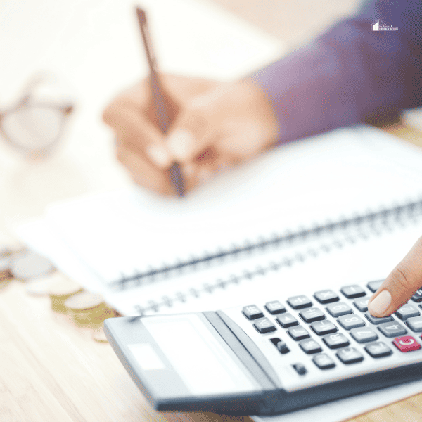 man calculating finances