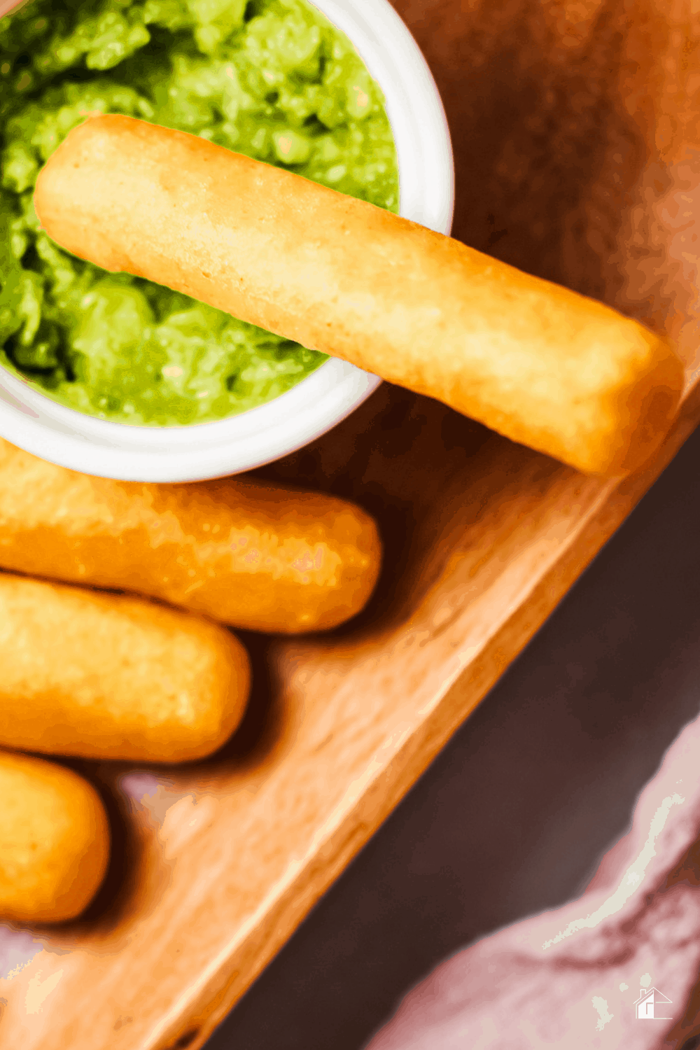 Learn how to make these cheesy Sorollitos. Sorullos are delicious corn fritters that are crispy on the outside and soft on the inside. #latinfood #puertoricanfood #hispanicfood via @mystayathome