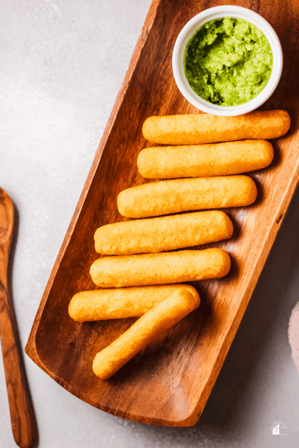 Learn how to make these cheesy Sorollitos. Sorullos are delicious corn fritters that are crispy on the outside and soft on the inside. #latinfood #puertoricanfood #hispanicfood via @mystayathome