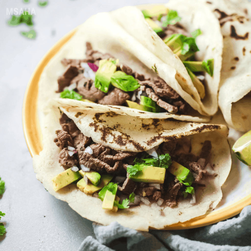 photo of steak tacos plated