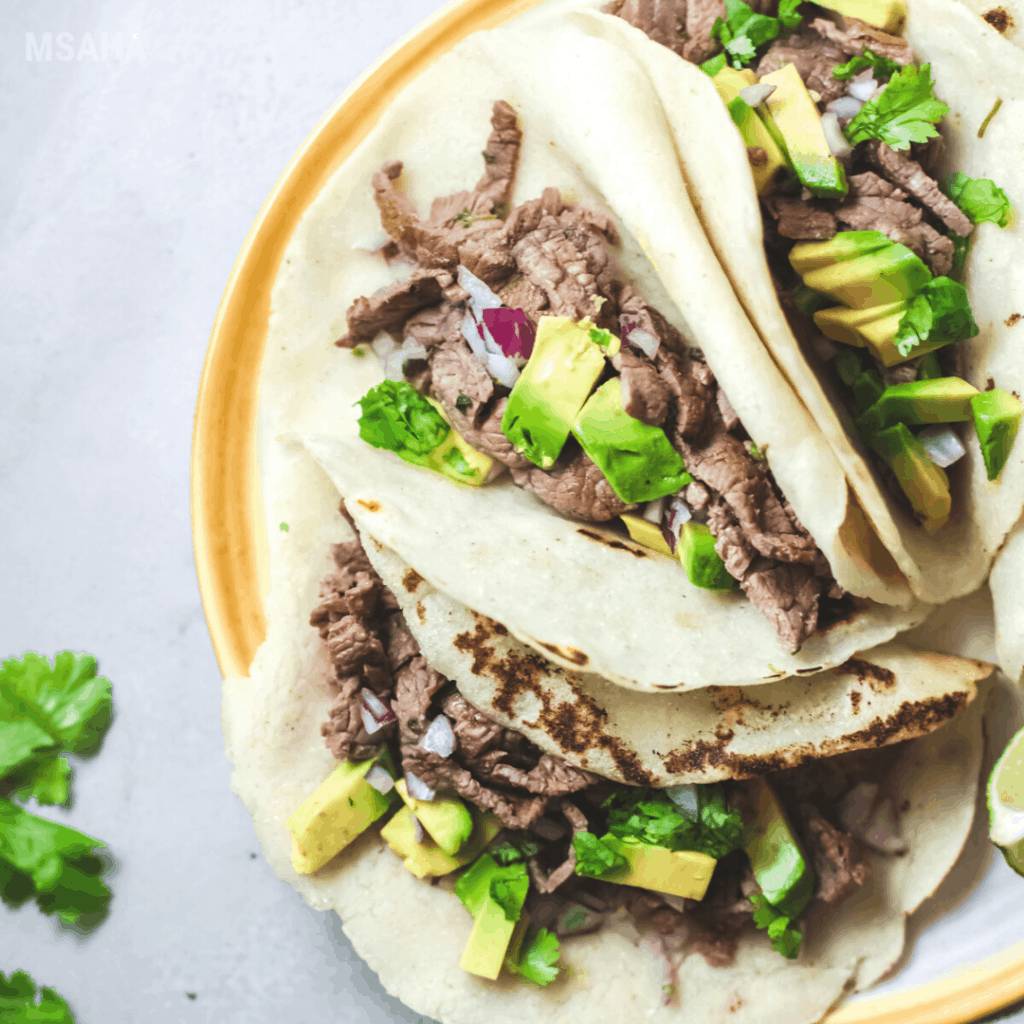 steak tacos plated