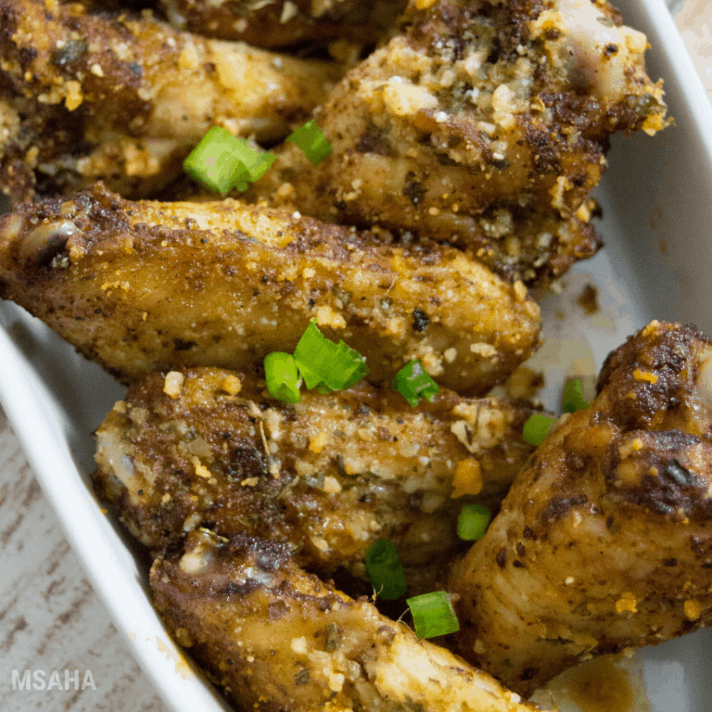 close up photo of cajun wings plated 