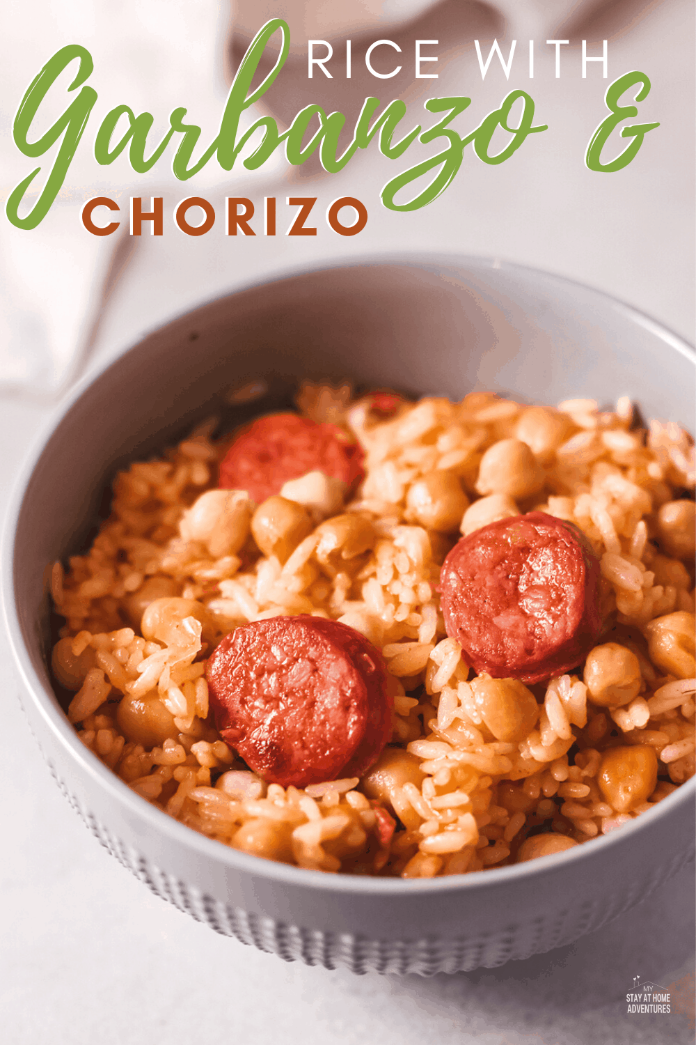 Arroz con chorizo y garbanzo (rice and garbanzo beans) is a flavorful combination of rice, sausage, and garbanzo beans. This easy dish is an inexpensive and delicious meal. via @mystayathome