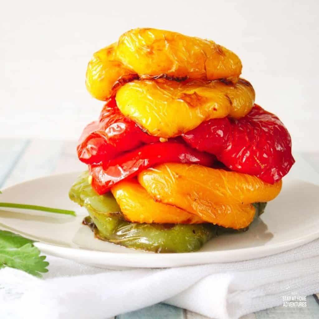 photo of roasted colorful roasted peppers stacked in plate