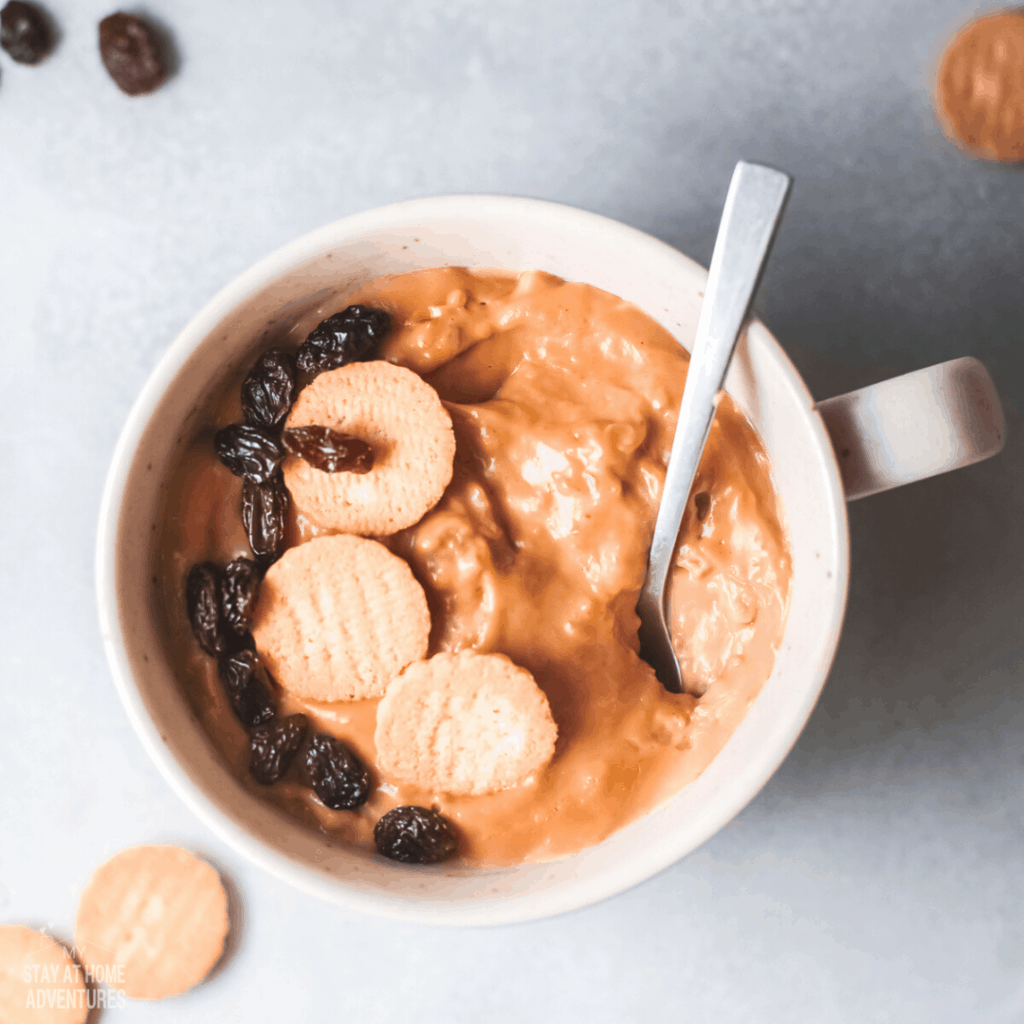 habichuelas dulce in a mug with a spoon