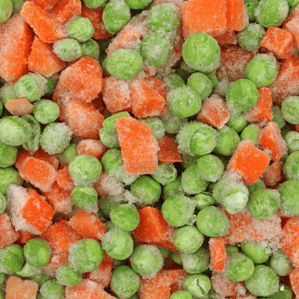 close up of frozen peas and carrots