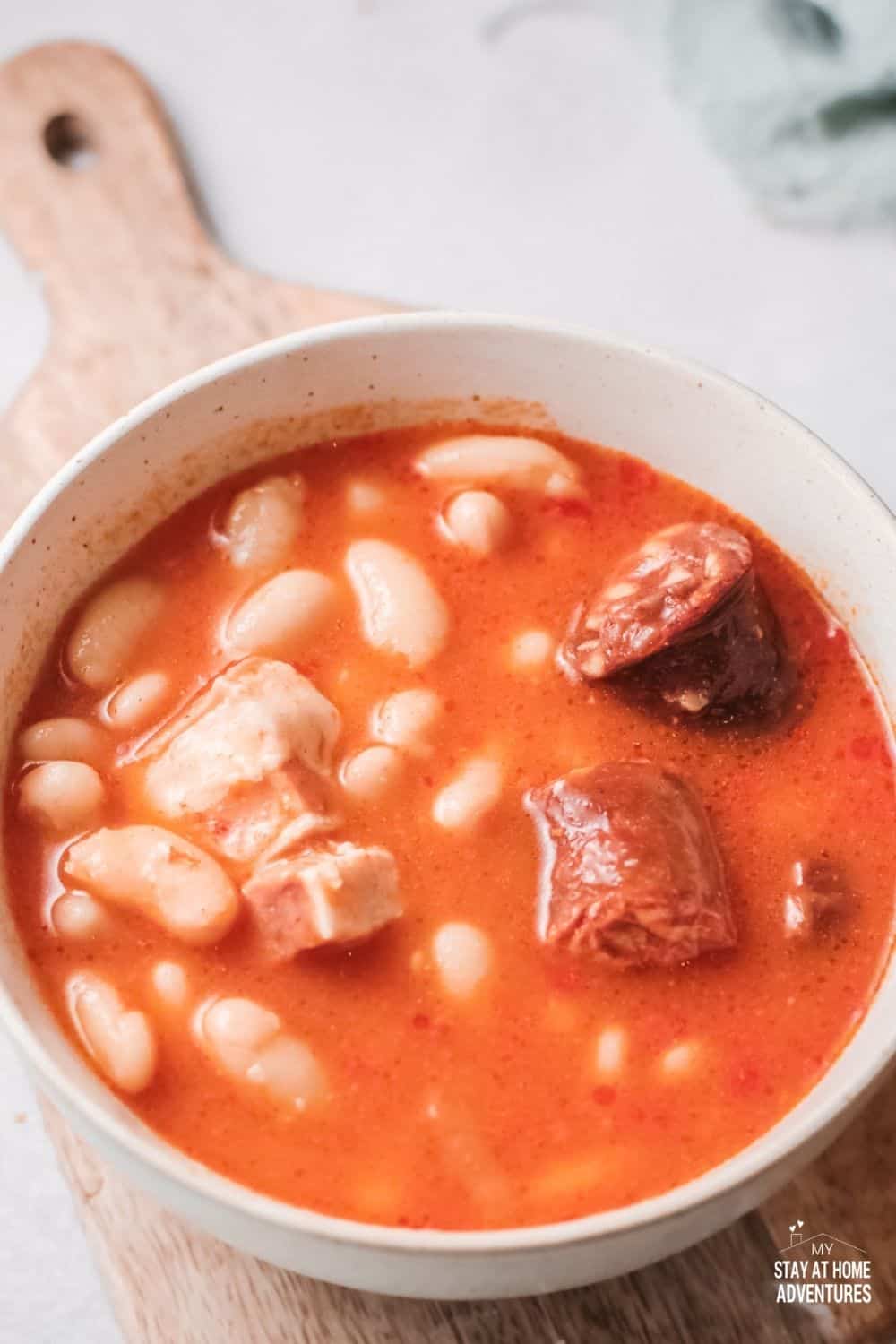 This delicious and hearty Fabada served in a bowl with all those flavorful meat is so comforting especially when served during the cold season. #soup #spanishsoup #fabada via @mystayathome