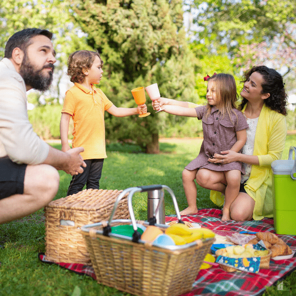 Family having a picnic in the park.