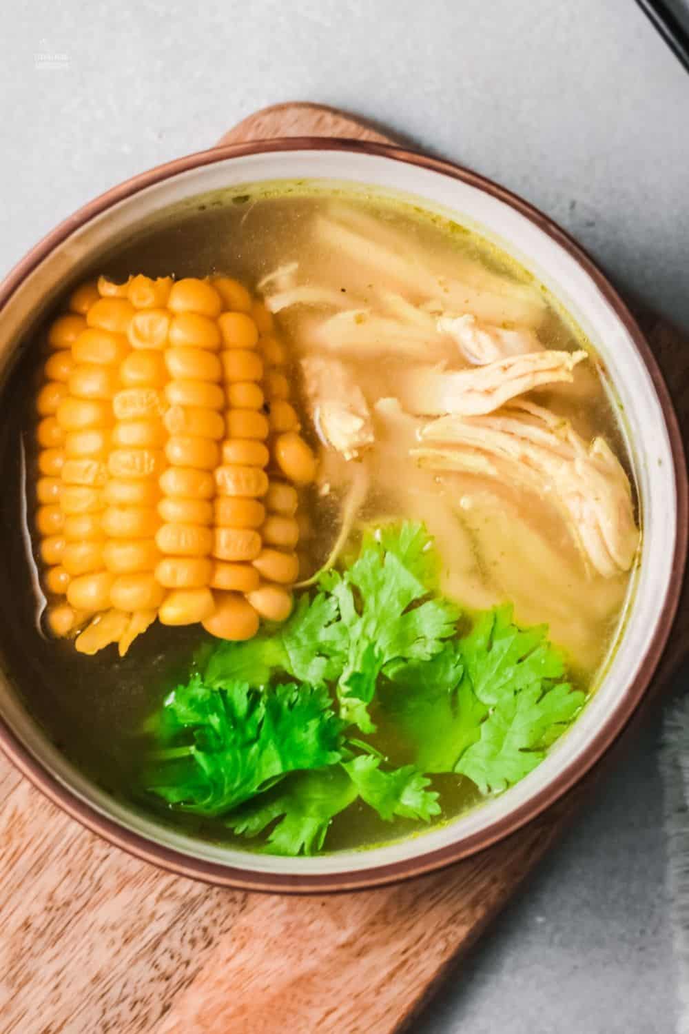 The unique flavor of Ajiaco makes me sip the warm liquid soup first before taking a spoonful of meat, potatoes, and corn. via @mystayathome