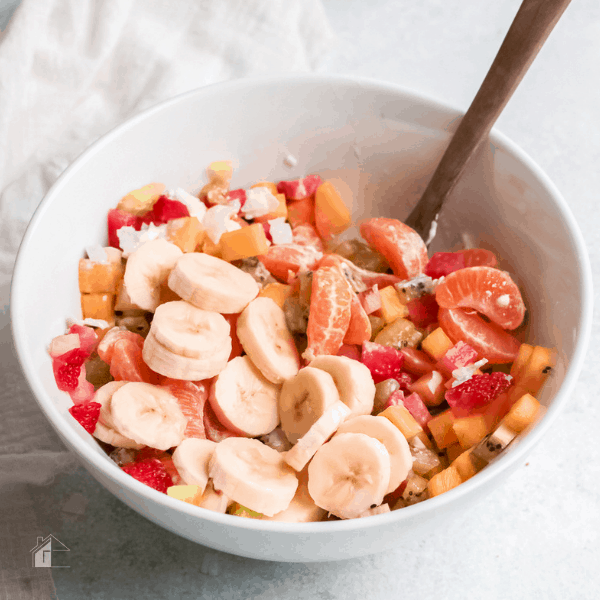 fresh fruit salad in a white bowl
