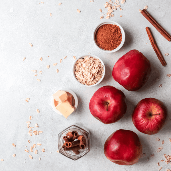 ingredients such as cinnamon sticks, apples, butter, and oats.