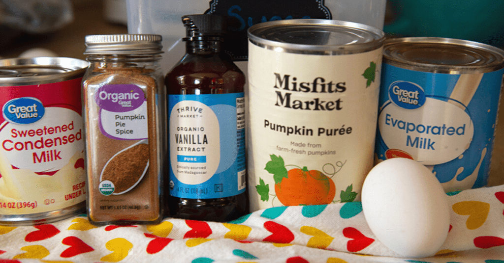 photo of ingredients to make flan:
sweetened condensed milk, pumpkin pie spice, vanilla, pumpkin puree, evaporated milk, egg