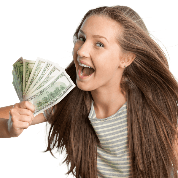 A happy young woman holding a fan of cash, representing excitement and motivation to save money and budget effectively in January.