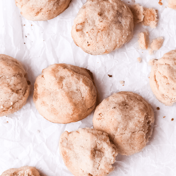 Mexican polvorones laying on wax paper.