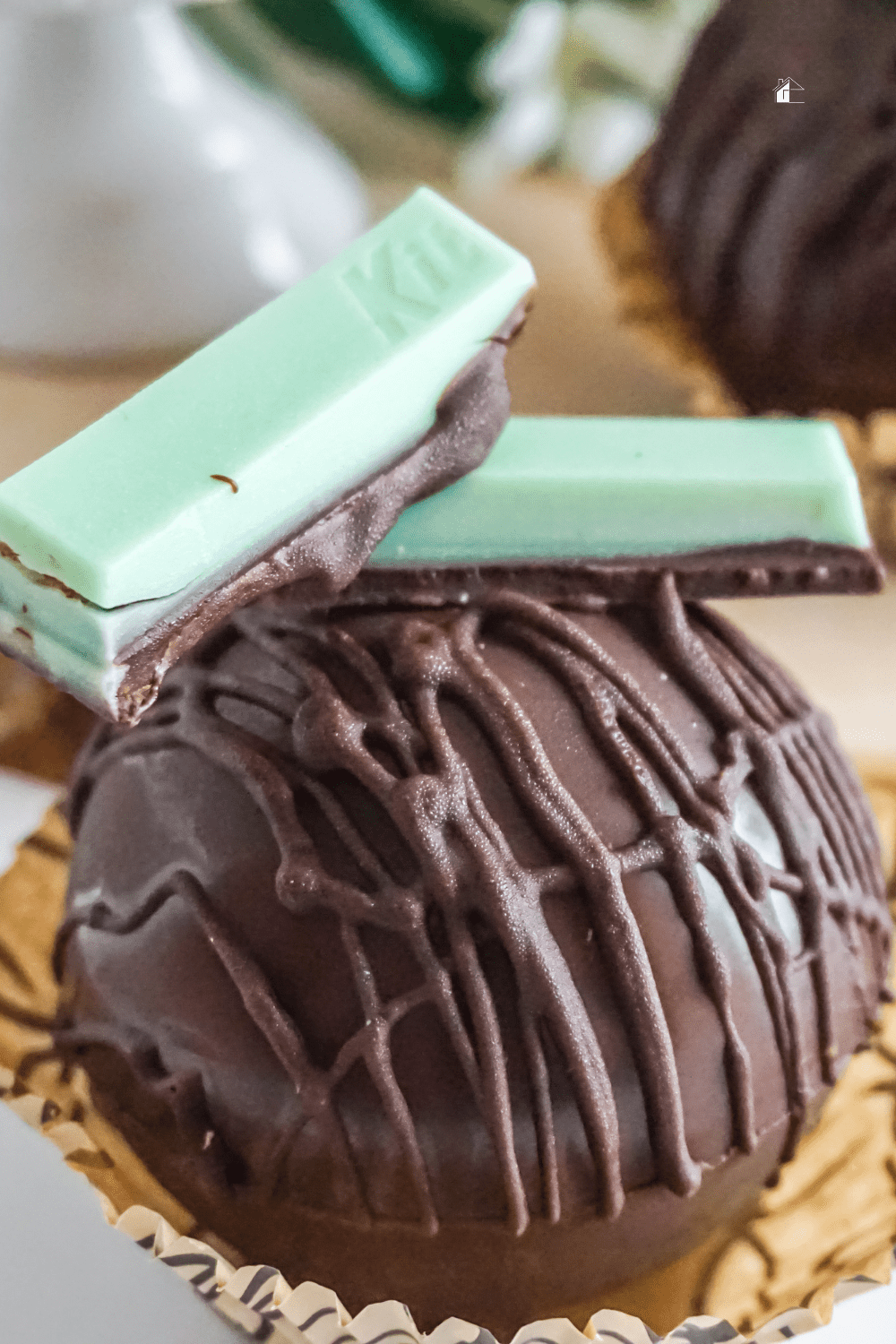 Try this delicious and easy recipe for a Mint Kit Kat Hot Cocoa Bomb this winter. It's the perfect drink to keep you warm! via @mystayathome