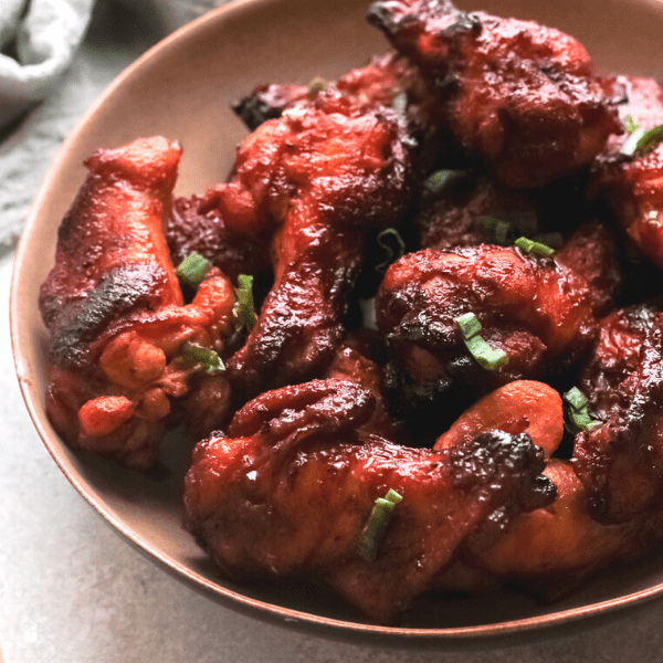 photo of air fried chicken wings in a plate.