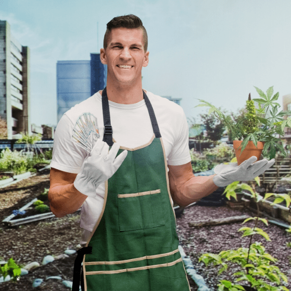 Smiling gardener holding money in garden