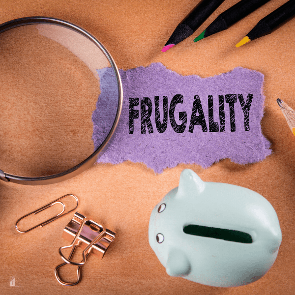 FRUGALITY concept. Magnifying glass, stationery and note paper