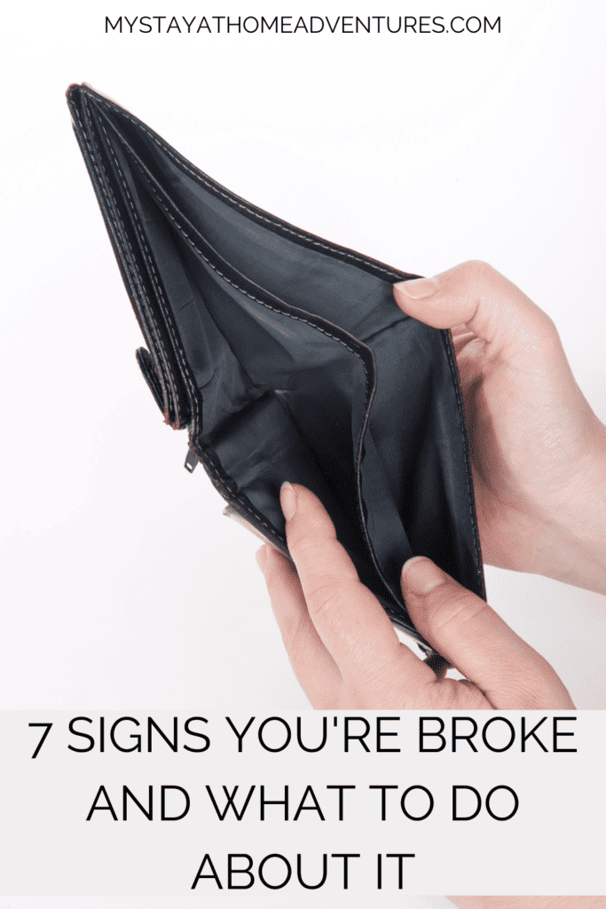 someone holding an empty wallet with text: "7 Signs You're Broke and What to Do About It"