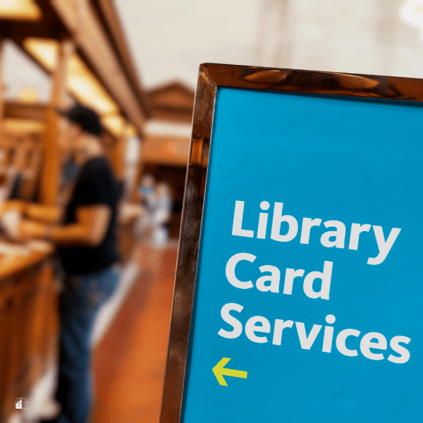 Sign that says Library Card Services inside a library.