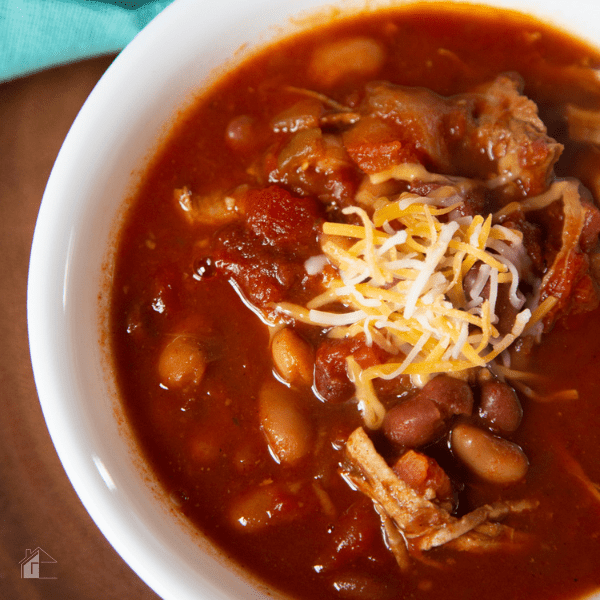Instant Pot Pulled Pork Chili topped with cheese