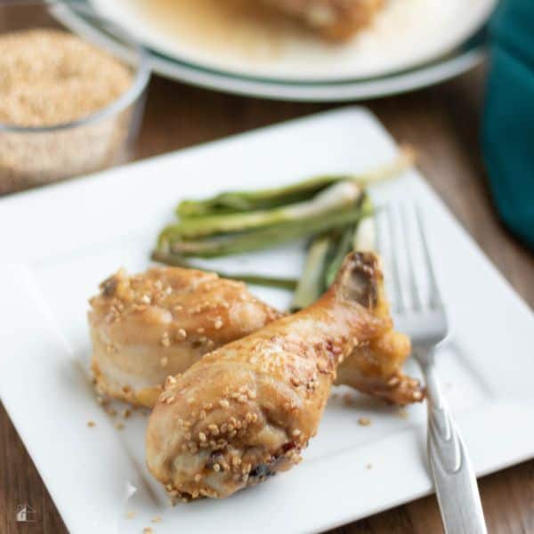 cooking chicken legs in air fryer - air-fried sesame chicken plated.