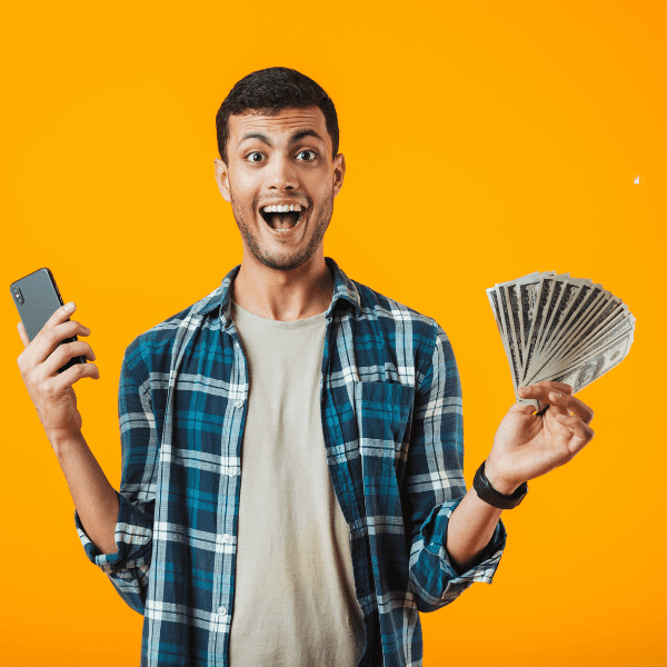 Cheerful Young Man Wearing Plaid Shirt Standing