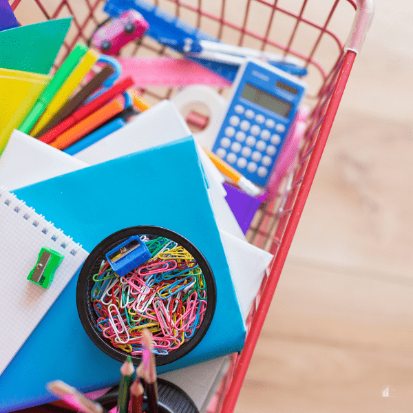 School supplies in shopping cart.