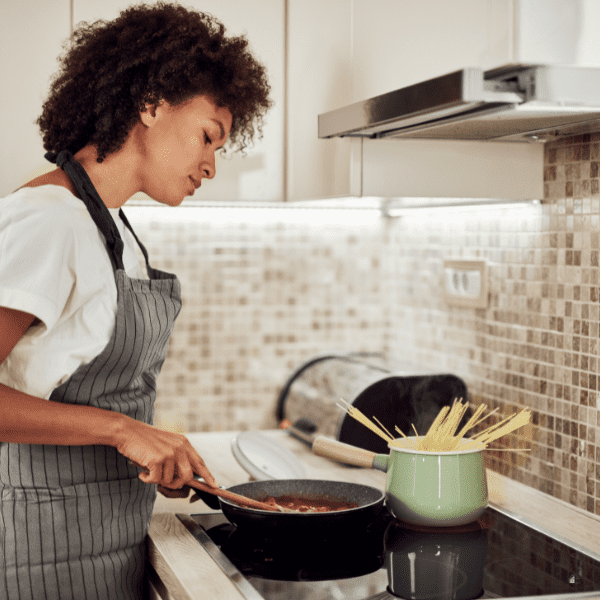 Woman cooking in the kitchen.