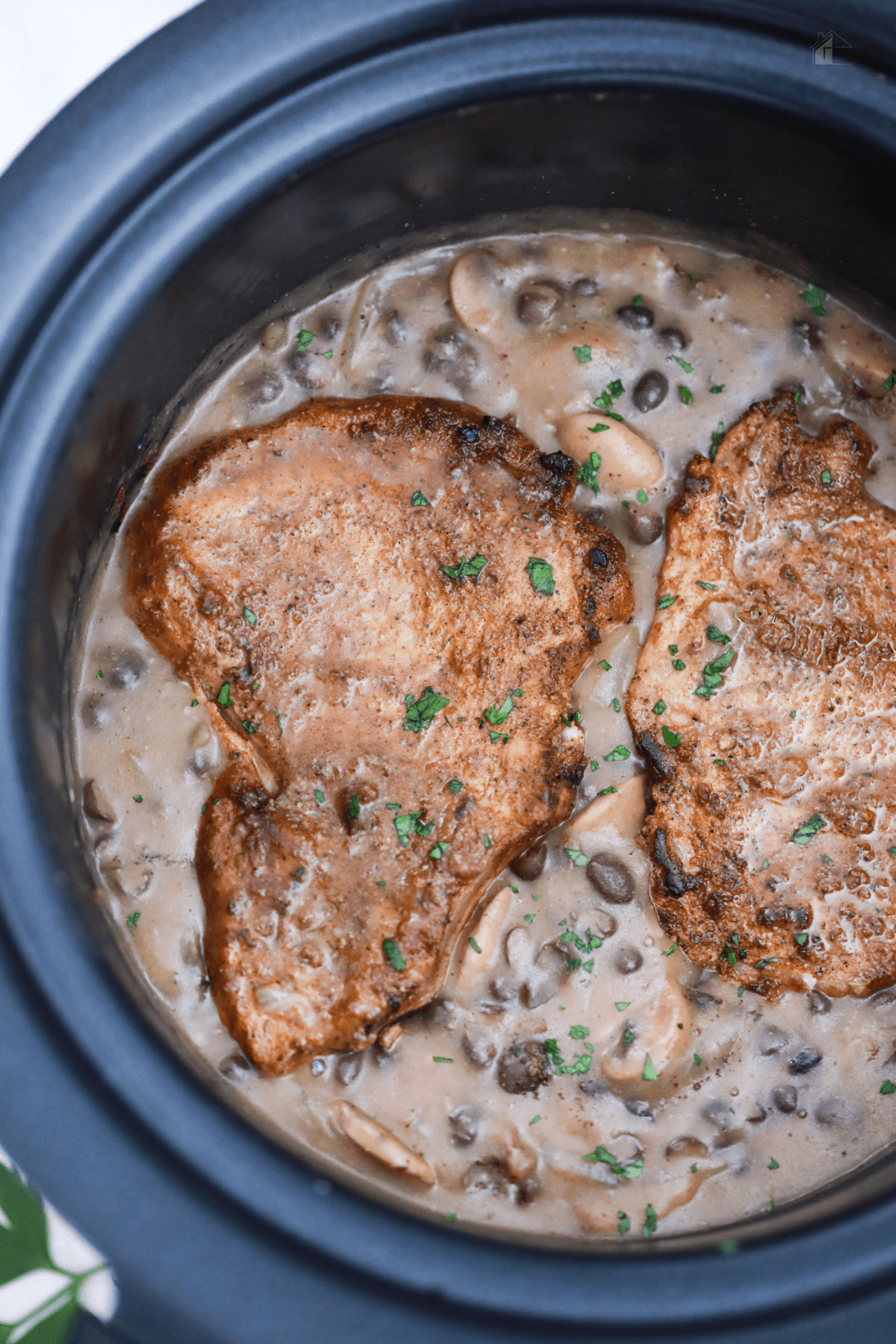 With just a few ingredients and a little bit of effort, you can create the best pork chops in a crock pot with delicious mushroom gravy. via @mystayathome