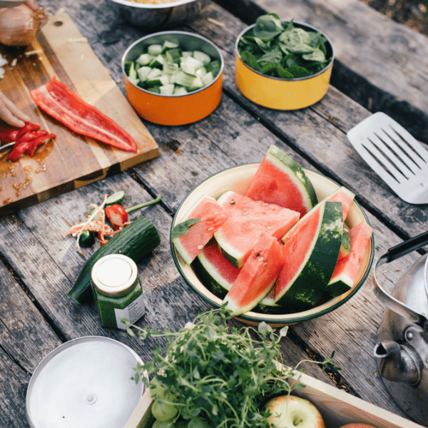 Prepping fresh ingredients outside.