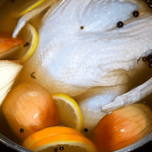 Brining a turkey overnight with oranges, pepper corn and onions.